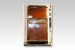 An Edwardian mahogany and dart inlaid narrow bureau having a slope front, a narrow centre drawer and