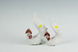 A pair of Lladro white fancy cockerels