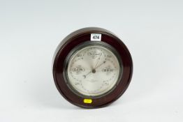 A mahogany framed wall barometer with silvered dial by Admiralty makers Sewill, 10 ins (26 cms)