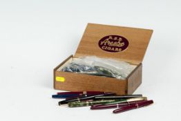 A large parcel of mixed fountain pens including Burnham 60, Parker Victory, and a Mabie Todd Swan