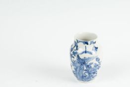 An 18th Century small Oriental blue and white vase with long tailed bird on a branch and flowers