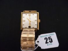 A gent`s rolled gold square dial Delma Blumar automatic calendar wristwatch with stainless steel