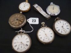 A parcel of six silver/white metal encased pocket watches and a white metal encased wristwatch
