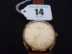A gent`s gold encased circular dial wristwatch by International Watch Company with original IWC