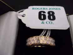 A nine carat gold modern wedding band, 4 grms; and a nine carat gold wishbone ring inset nine CZs