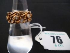 An eighteen carat Welsh gold floral and pierced ring, 6.2 grms