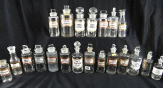 A collection of smaller pharmaceutical jars and bottles, all having various labels, tallest 7.75 ins