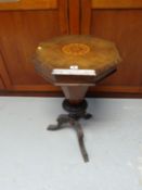 A rosewood tripod octagonal topped sewing table with good fitted interior, marquetry top and