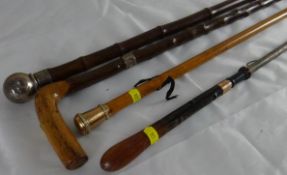 A small parcel of walking canes, two shooting sticks and a Victorian bamboo effect walking cane with