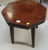 A small mahogany occasional table, the top removed from a Georgian cellarette on square tapered