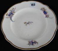 Nantgarw Porcelain; a plate decorated with blue and iron red flowers, impressed mark to the base