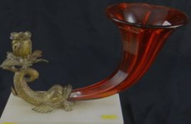 A cranberry glass cornucopia trumpet style vase with a gilt bronze candleholder, the vase issuing