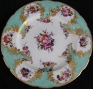 Swansea Porcelain; a twelve lobed plate painted with a central display of flowers accompanied by