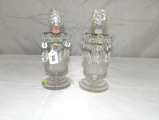 A pair of late 18th Century cut crystal glass lustres with bulbous terraced stems and circular bases