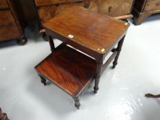 An early 19th Century mahogany twin tread library step having a rectangular top with rounded corners