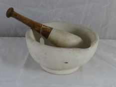 A very large stoneware pestle and mortar, 12 ins diam.