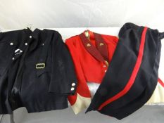 A Welsh Regimental officer’s mess suit together with a similar mourning suit.