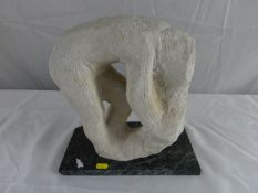 JONAH JONES; a stone sculpture ‘Susannah & The Elders’ on a dark marble plinth (damage to one