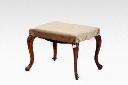 An early 19th Century stool with four corner cabriole supports.