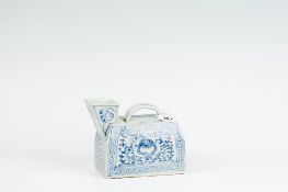 A 19th Century Oriental blue and white oblong water pot having a large square spout with top handle.
