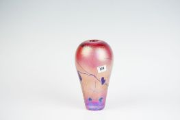 A John Ditchfield Glasform pink lustrous vase with a tapered base and with applied purple leaf