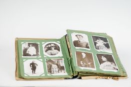 An album of old photographic postcards but mainly including a large parcel of signed early 20th