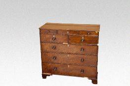 A mid 19th Century mahogany chest of three long and two short drawers with three narrow upper