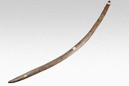 A large Aboriginal scratch work boomerang believed to be from the North West territories 54