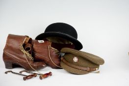 A service dress cap; a bowler hat; and a pair of 1920s lady`s boots.