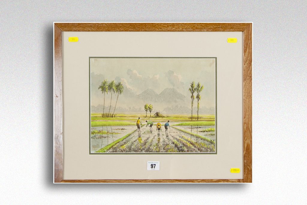 MALAYSIAN SCHOOL watercolour; workers in paddy fields with mountain backdrop, 9.25 x 12.5 ins (23