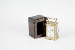A brass encased non-striking carriage clock with case.