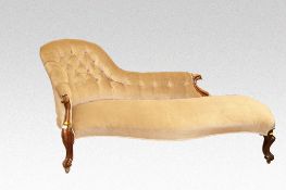 A Victorian mahogany button backed chaise longue with cabriole supports.