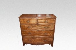 An early 19th Century mahogany chest of three long and two short drawers with brass drop handles, 41