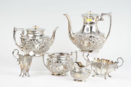 A four piece electroplated tea and coffee service, each piece of oval scrolled bright cut form;