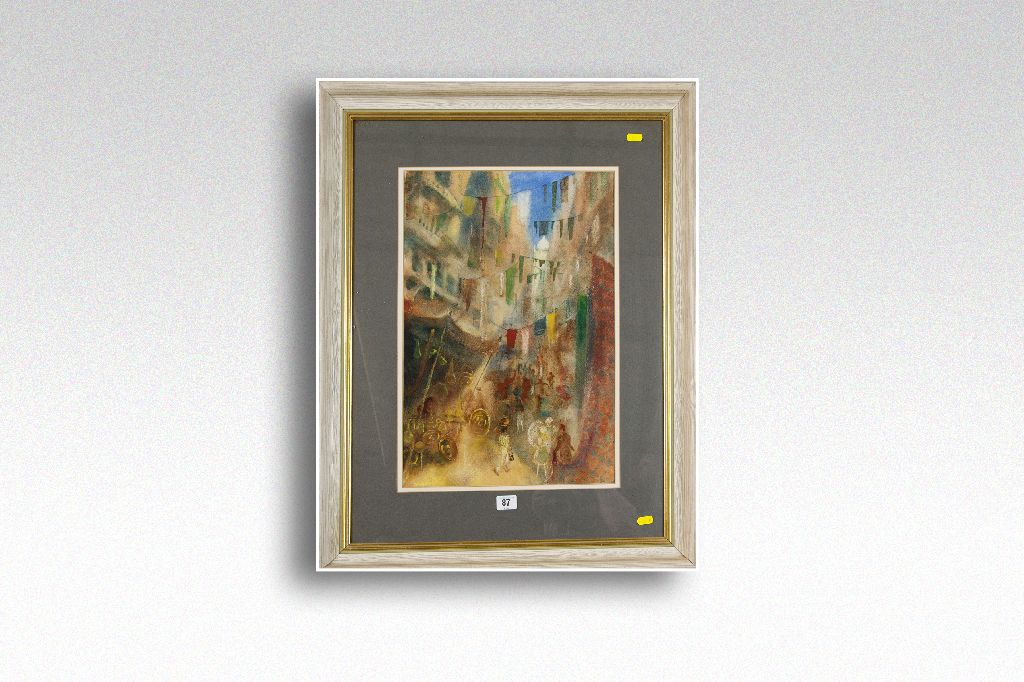 CONTINENTAL SCHOOL watercolour; washing bedecked narrow street scene with figures, 20 x 13.25 ins (