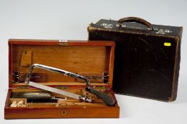 A mahogany encased medical amputation set; and a large parcel of other mixed medical items,