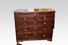 A mahogany chest of drawers (for restoration) having three long and two short drawers on bracket