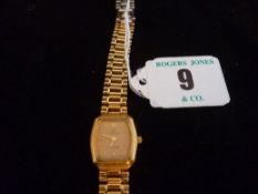 A lady`s Omega De Ville oblong dial yellow metal encased, believed gold, stainless steel backed