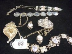 A parcel of sterling and other silver filigree jewellery and a bracelet of seven silvered