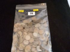 A large parcel of British silver sixpence pieces, 1,030 grms (33 ozs).