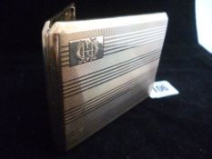 A gent`s nine carat gold cigarette case with 1927 presentation inscription inside, engine