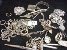 A parcel of silver and white metal mixed jewellery including a silver vesta, a tortoiseshell and