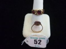 A fifteen carat gold amethyst (three) and seed pearl (four, one missing) dress ring; and a nine