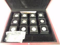A CASED SET OF TWELVE COINS; London Mint Office issued half crowns, crowned bust to reverse, 2009.