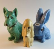 Three Sylvac ceramic monochrome animals including a seated terrier, a seated comic dog and a rabbit