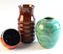 POOLE `Green Clouds` baluster vase, 6 ins (15 cms); a Poole Pottery `open cup` bowl shaped vase; and