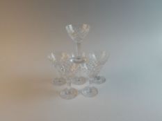 A set of six early 20th Century cut glass crystal champagne bowls with varied diamond cut decoration
