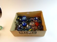 A parcel of approximately twenty-two mainly Caithness glass paperweights, many Limited Edition