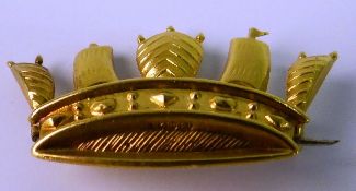 AN EARLY 20TH CENTURY GOLD BROOCH; With sail and cast gold gem decoration. Marked 15ct, 2g gross