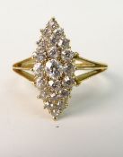 A LATE VICTORIAN DIAMOND COCKTAIL RING; The old cut diamonds to marquisette shaped mount on tri-